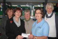 Lions\' Ladies presenting a cheque for £250 to Teresa Hawkes, Manager at The King\'s Centre Food Bank